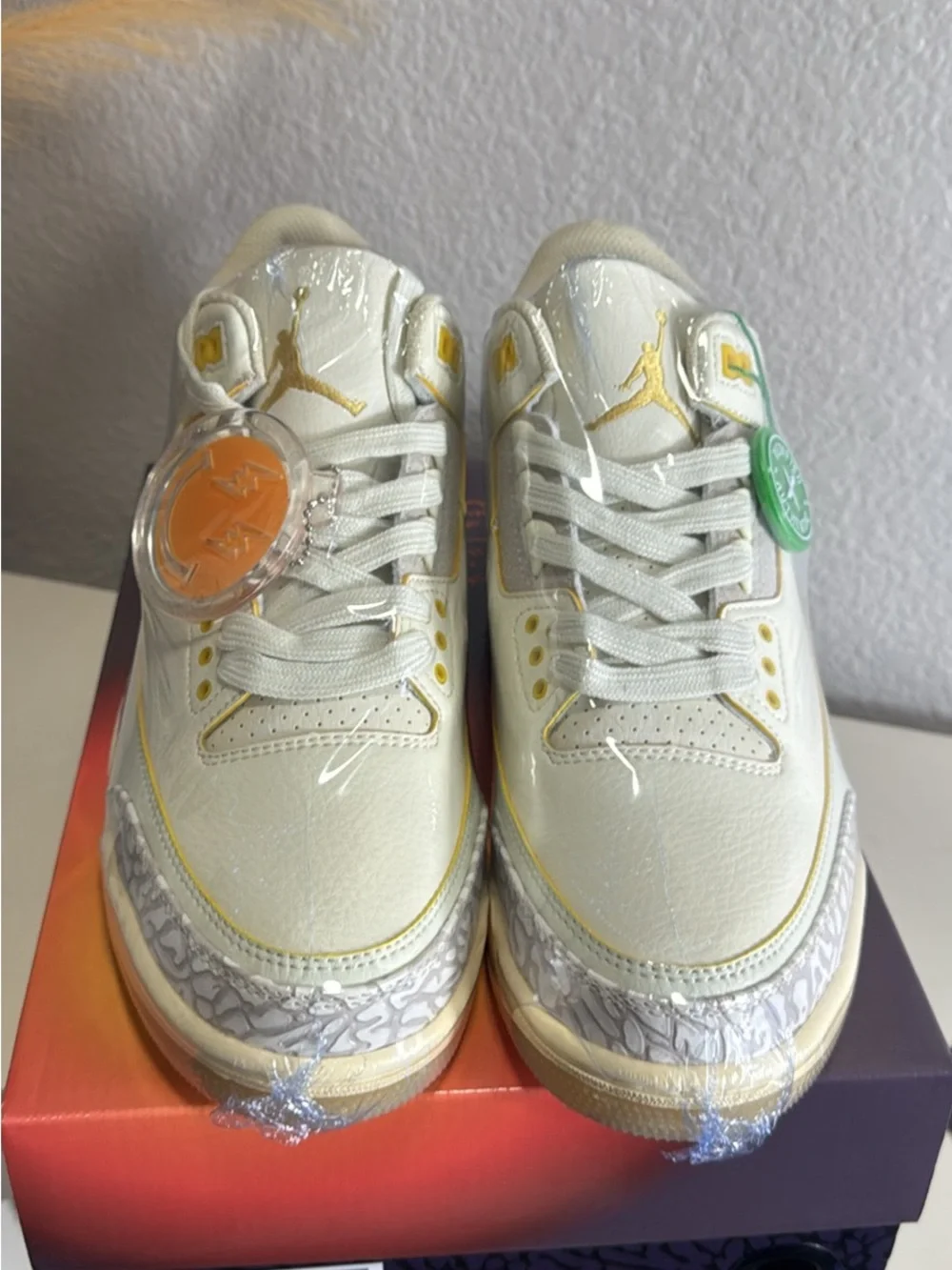 Jordan Men's White Sneakers with Multicolor Heel Accent